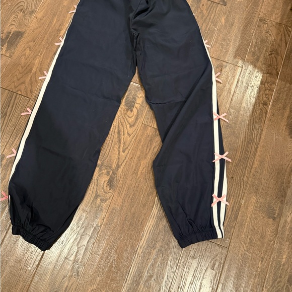 Women’s size XS  Edikted navy blue track pants with side stripe bow detail - Picture 2 of 6